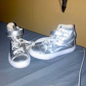 Silver converse tennis shoes high top